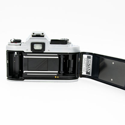 Pre-Owned Nikon FG 35mm Film Camera w/Sigma 35-70mm Lens