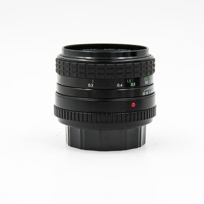 Pre=Owned Sigma Mini-wide 28mm f/2.8 multi-coated lens for Minolta MD