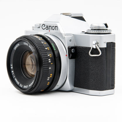 Pre-Owned Canon AV-1 with 50mm f/1.8 S.C. FD Lens