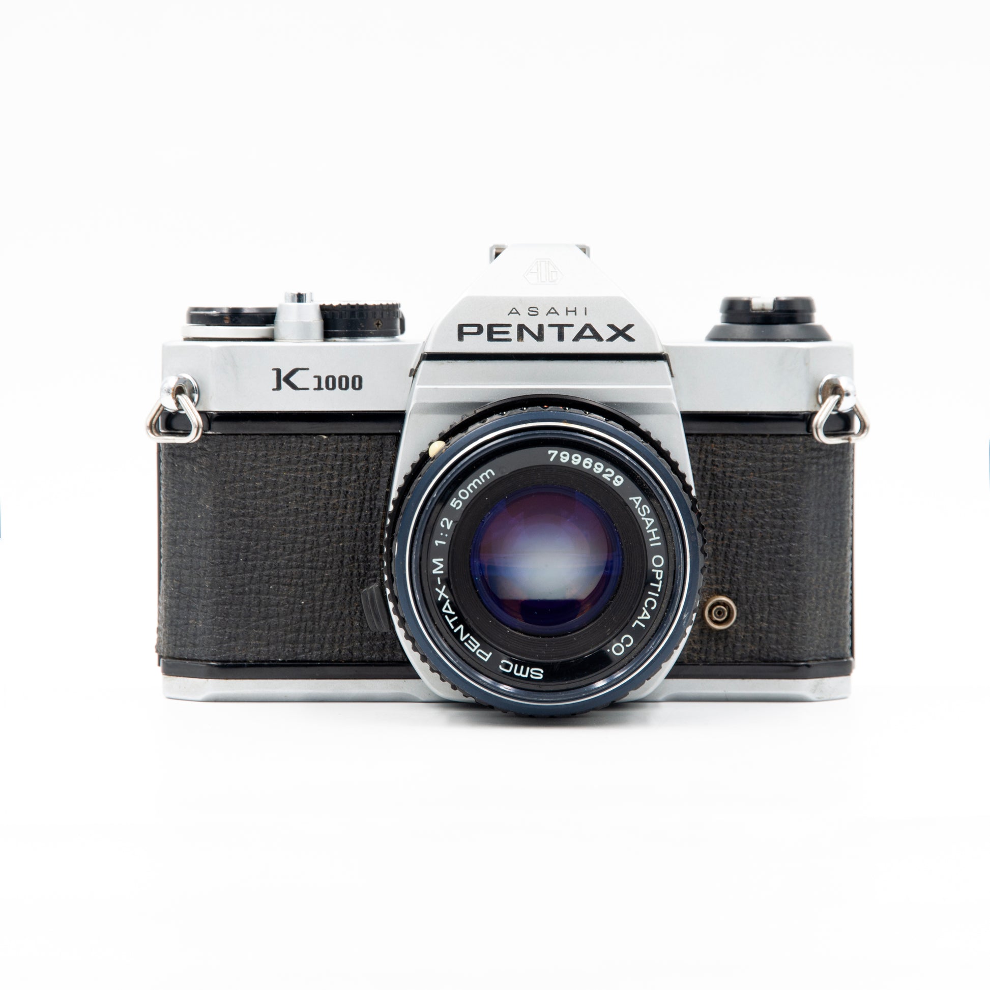 Pentax K1000 with Pentax 50mm f2 lens, from front.